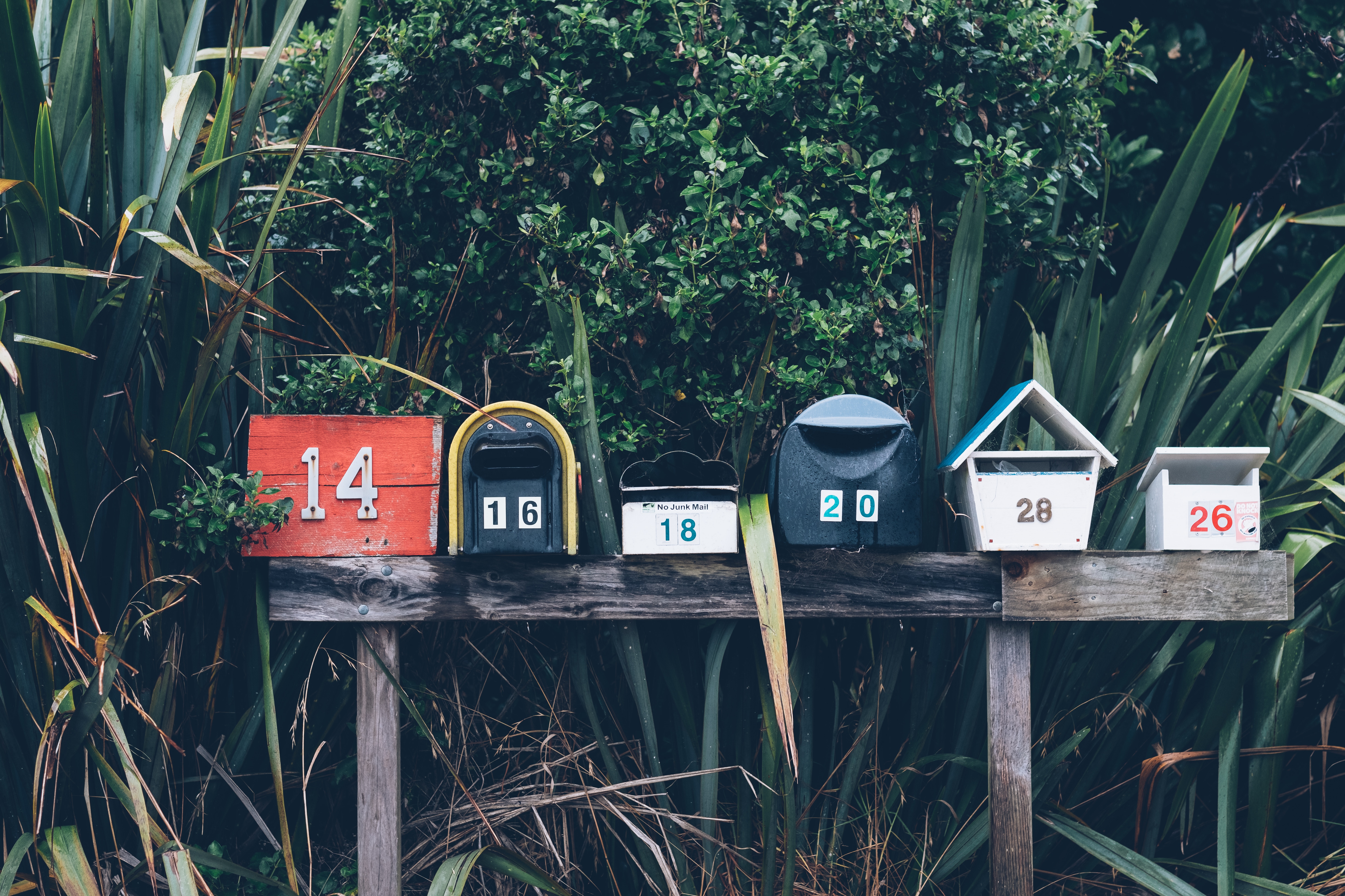 mathyas-kurmann-102977-unsplash-mailboxes